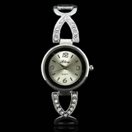 Petite montre femme fine en métal argenté avec strass