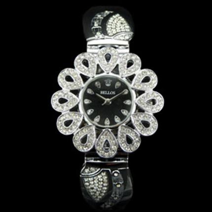 Magnifique montre pour femme en métal argenté avec des strass